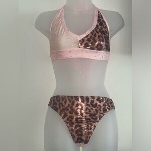 Two-piece pink and leopard print stripper dance outfit